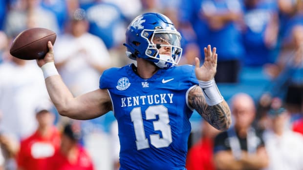 Sep 2, 2023; Lexington, Kentucky, USA; Kentucky Wildcats quarterback Devin Leary (13) throws a pass during the first quarter against the Ball State Cardinals at Kroger Field. Mandatory Credit: Jordan Prather-USA TODAY Sports